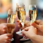 Celebration. People holding glasses of champagne making a toast