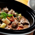 Beef Stew in a slow-cooker, ready to serve.