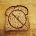 Slice of bread with Gluten text - Gluten Free diet concept